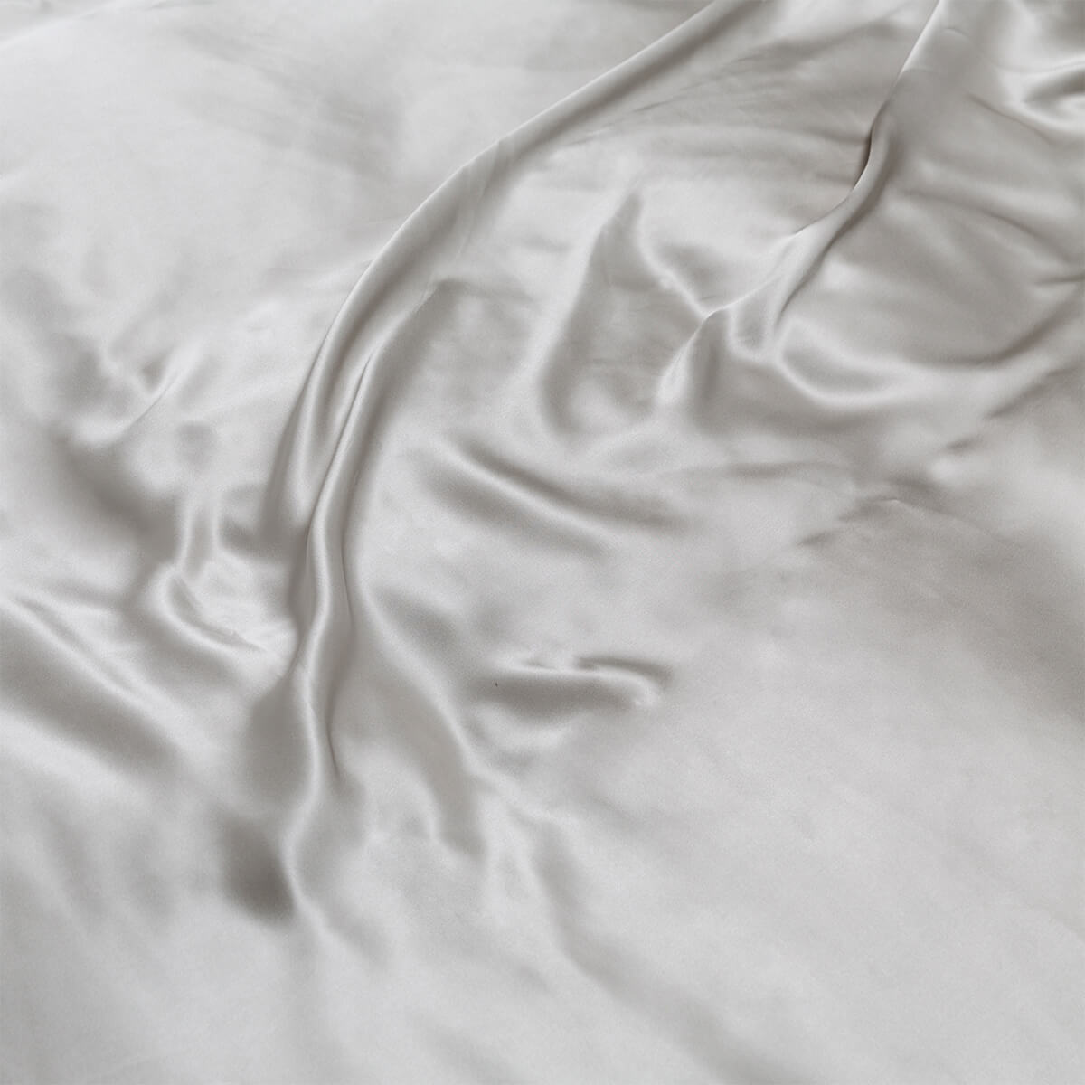 Antique Silver Pure Mulberry Silk Bedding & Bed Sheets styled in a bedroom 1 | Soak and Sleep