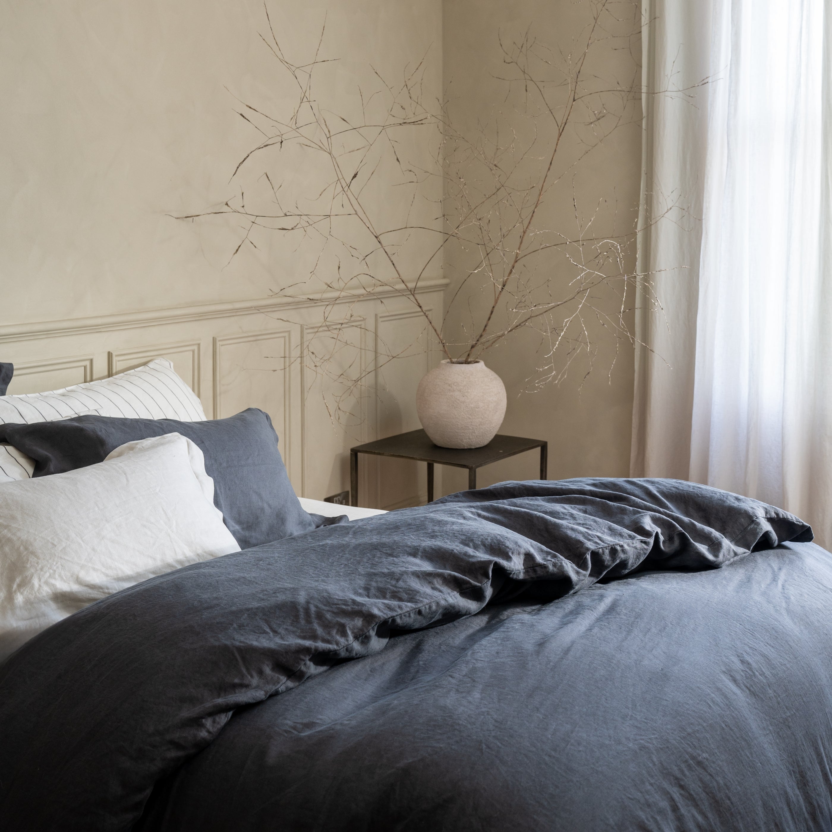 Midnight Grey French Linen Pillowcases in a styled bedroom 5 | Soak and Sleep