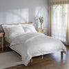 White 400 Thread Count Cotton Dobby Stripe Duvet Cover styled in a bedroom | Soak and Sleep