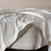 Ivory 600 Thread Count Egyptian Cotton Flat Sheet styled in a bedroom 1 | Soak and Sleep