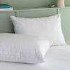 Anti Bed Bug Pillow and Mattress Encasements styled in a bedroom | Soak and Sleep