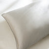 Antique Silver Mulberry Silk Pillowcases styled in a bedroom | Soak and Sleep