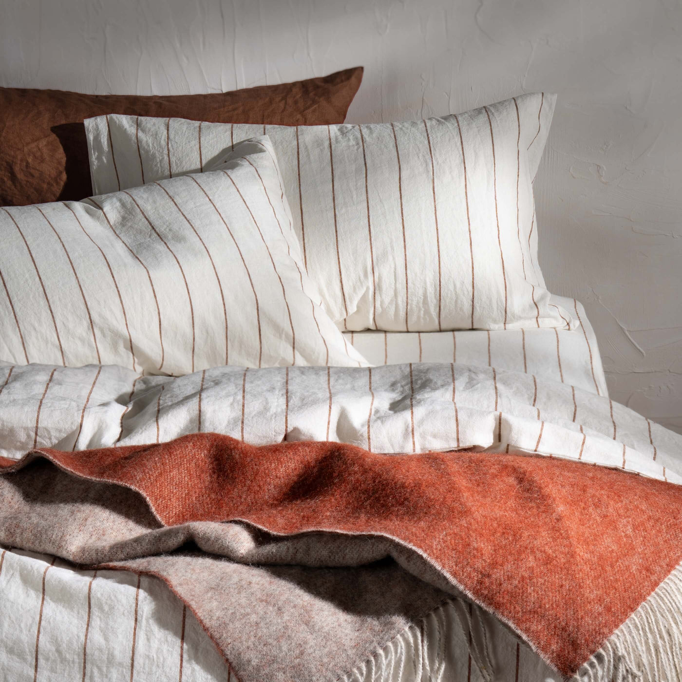White/Burnt Orange Pinstripe Linen Cotton Blend Bedding close-up detail 1 | Soak and Sleep