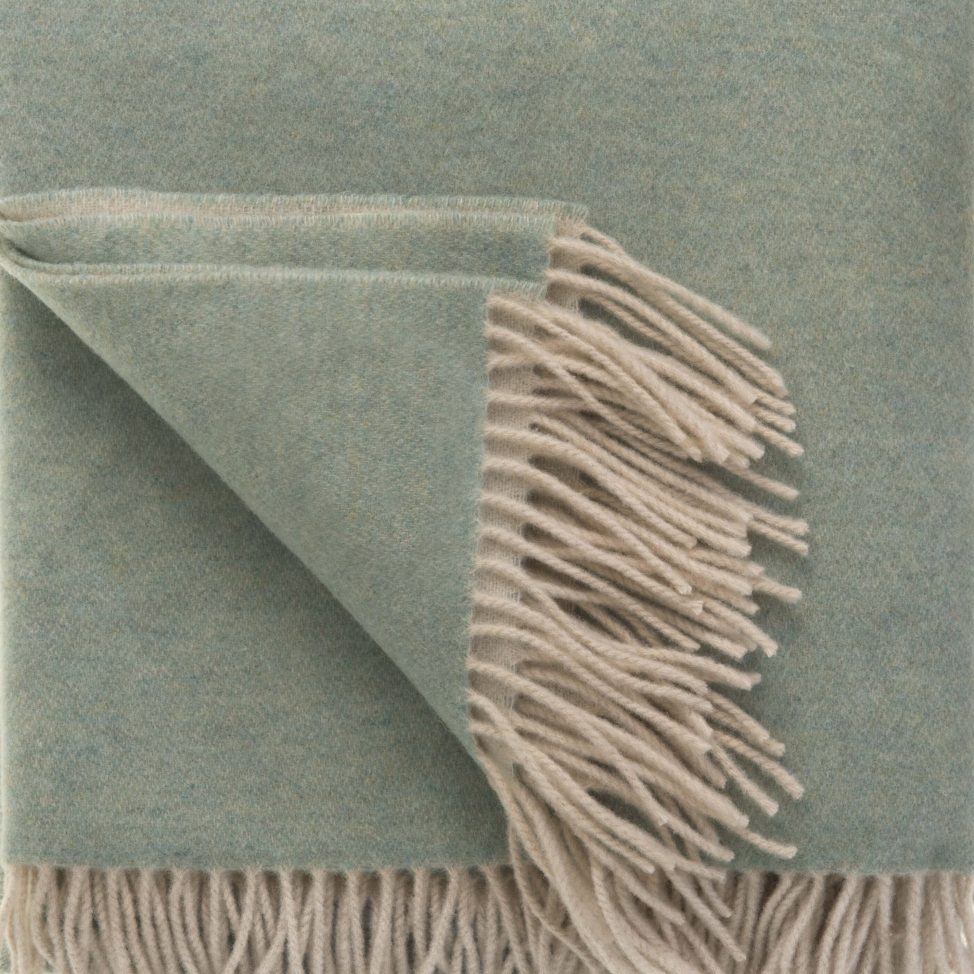 Duck Egg Wool With Cashmere Throw styled in a bedroom | Soak and Sleep