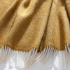 Mustard Herringbone Pure Wool Throw bedroom detail | Soak and Sleep