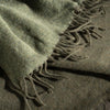 Olive Green Luxury Wool with Cashmere Throw styled in a bedroom | Soak and Sleep