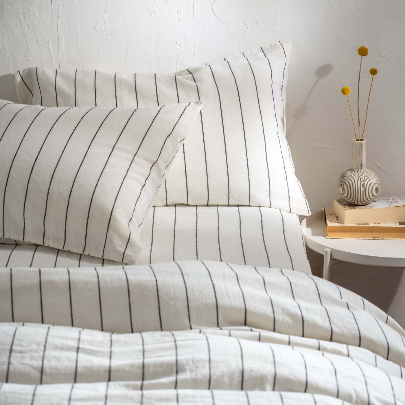 White/Blackberry Pinstripe Linen Cotton Blend Bedding styled in a bedroom | Soak and Sleep