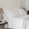 White 200 Thread Count Egyptian Cotton Bed Sets styled in a bedroom | Soak and Sleep