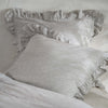White & Grey Ruffled Linen Cotton Blend Bedding bedroom detail | Soak and Sleep