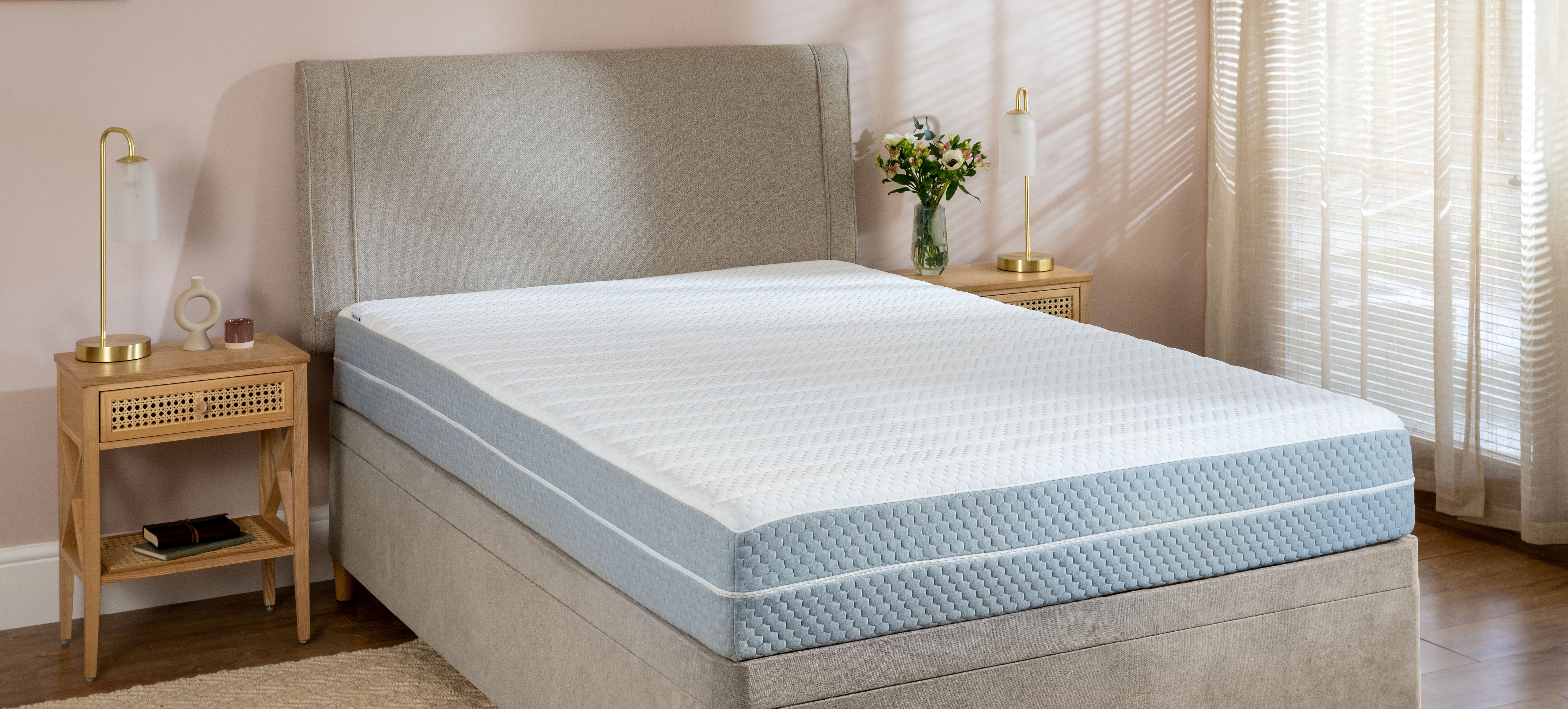 Soak&Sleep Memory Foam Mattress - styled in a bright, fresh bedroom with sunlight beaming through the blinds.