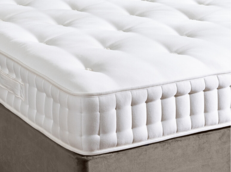 The corner of a Natural Filled Mattress