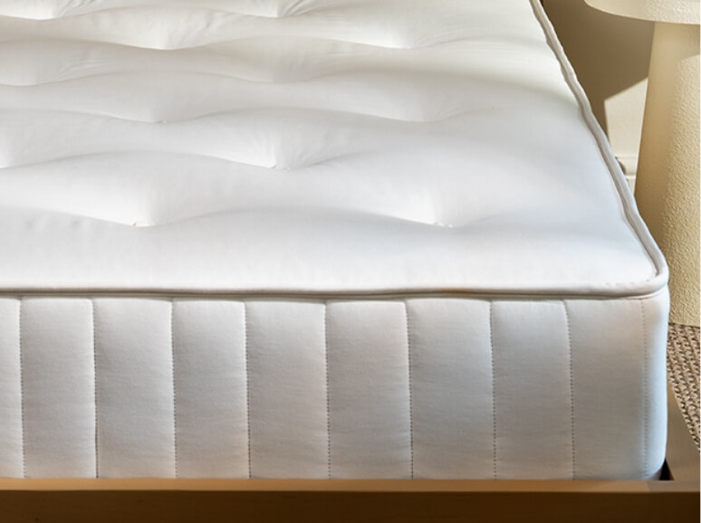 The corner of a Traditional Spring Mattress