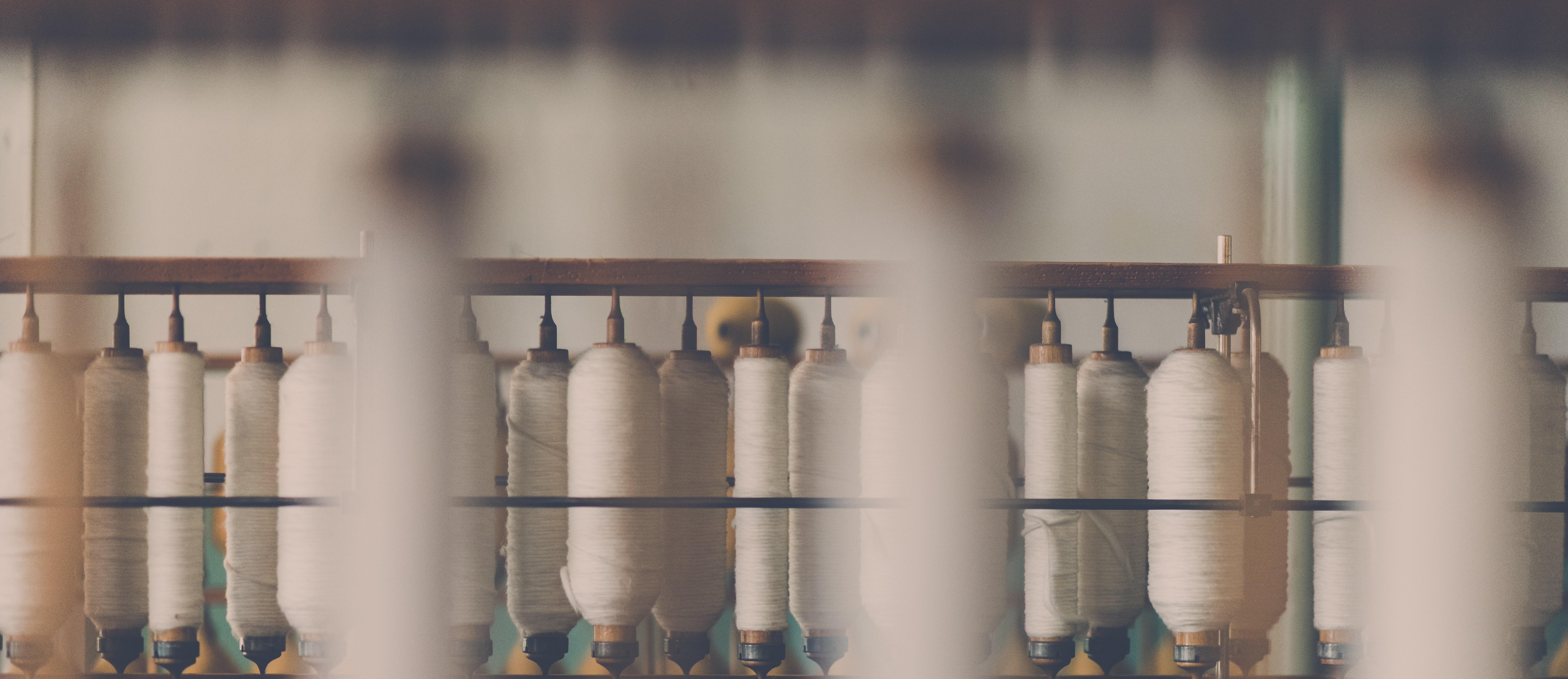 Multiple reels of thread in a factory